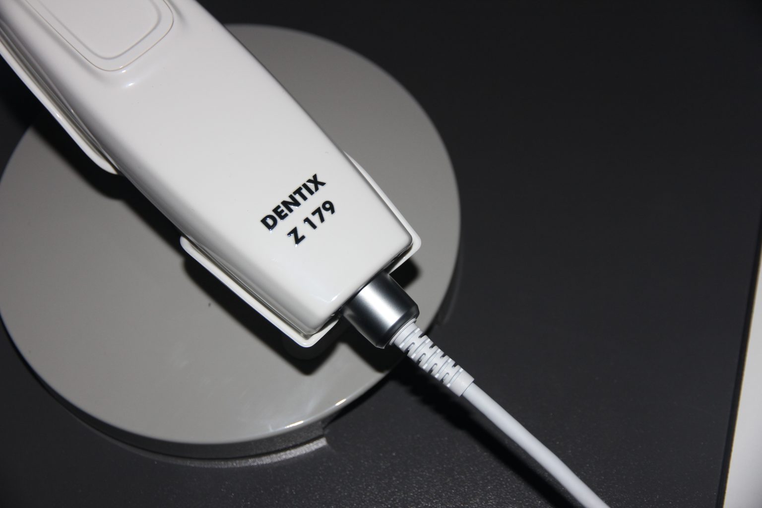 DENTIX Z179 scanner close-up on dark surface